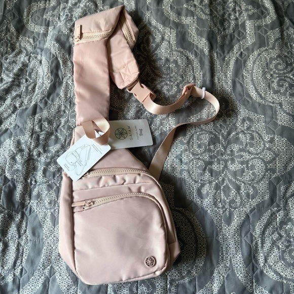 GAIAM Handbags - Gaiam Pink Festival Sling Bag NWT Multi Pocket Nylon Sling Bag - Pink